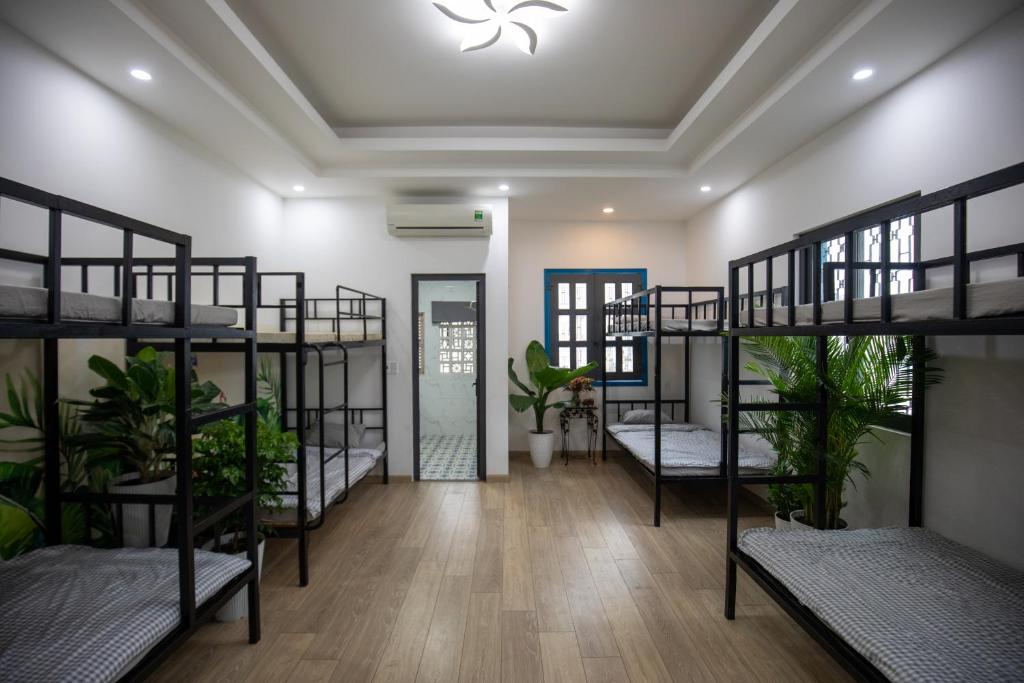 Postel nebo postele na pokoji v ubytování Vungtau Surf House - Hostel Surf Camp