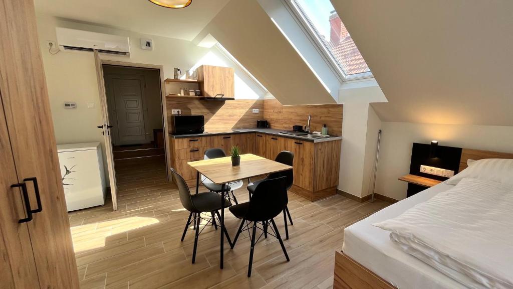 Kuchyň nebo kuchyňský kout v ubytování Rezidex Apartmanház