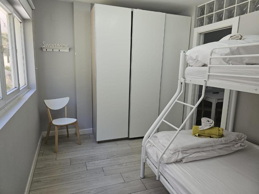 Postel nebo postele na pokoji v ubytování Precioso Apartamento en la plaza