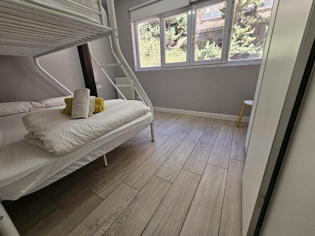 Postel nebo postele na pokoji v ubytování Precioso Apartamento en la plaza