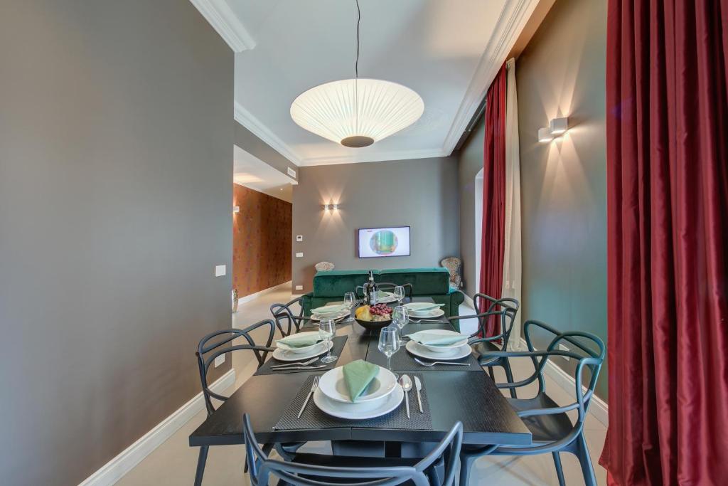 TV a/nebo společenská místnost v ubytování Seven Suites Apartments - Via Matteotti 178