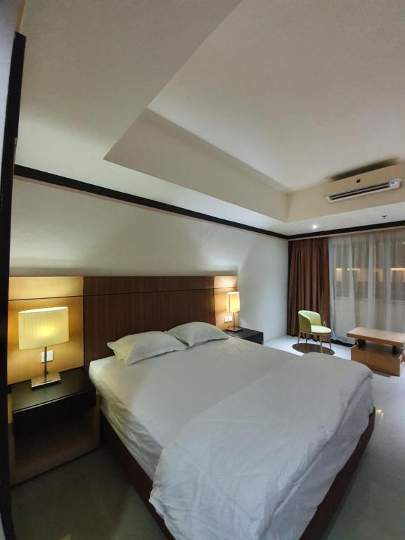 Postel nebo postele na pokoji v ubytování Nagoya Mansion Provide Netflix near Mall and CBD