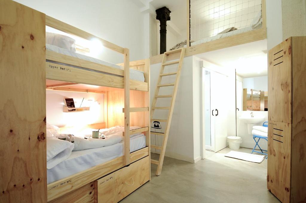Cama o camas de una habitación en The Hat Madrid