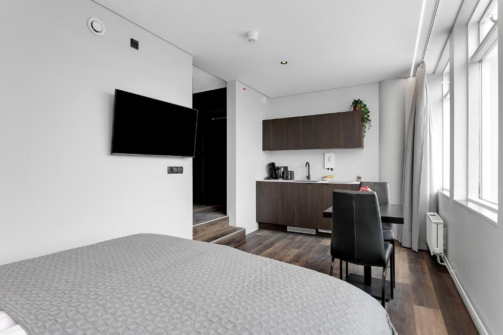 TV a/nebo společenská místnost v ubytování ALVA Apartments