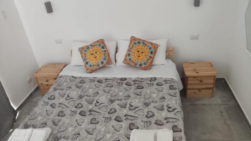 Postel nebo postele na pokoji v ubytování Villa in campagna vicina al mare Bonerelax