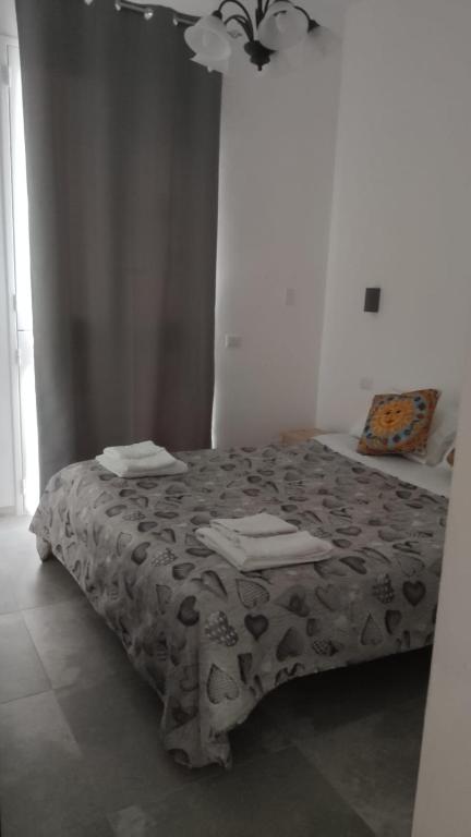Postel nebo postele na pokoji v ubytování Villa in campagna vicina al mare Bonerelax