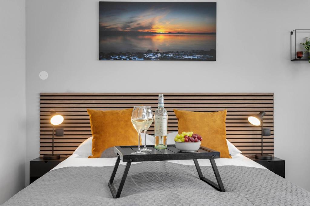 Postel nebo postele na pokoji v ubytování ALVA Apartments