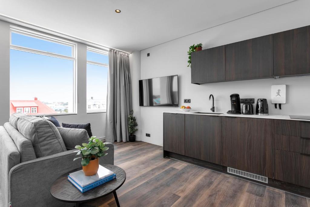 Kuchyň nebo kuchyňský kout v ubytování ALVA Apartments