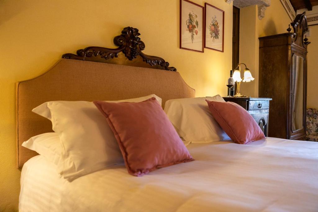 Postel nebo postele na pokoji v ubytování Agriturismo Pometti - Villa Boscarello