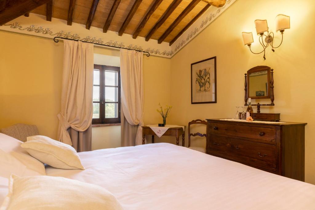 Postel nebo postele na pokoji v ubytování Agriturismo Pometti - Villa Boscarello