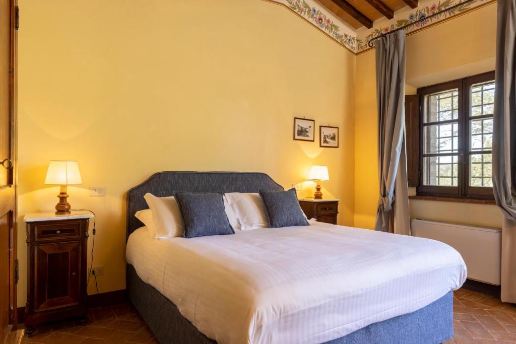 Postel nebo postele na pokoji v ubytování Agriturismo Pometti - Villa Boscarello