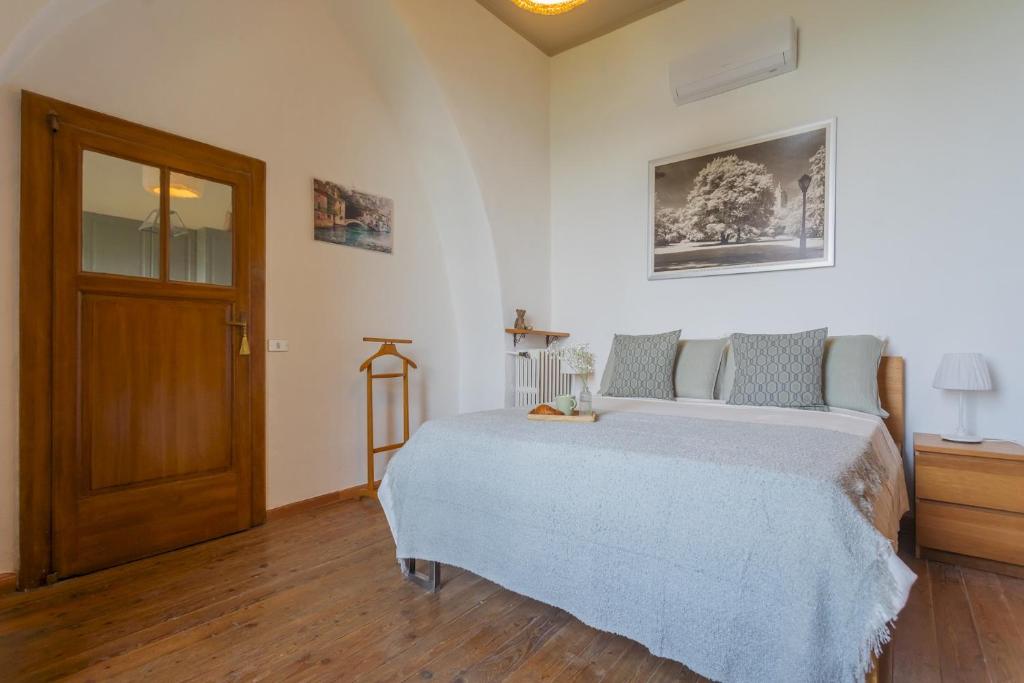 Postel nebo postele na pokoji v ubytování Simons Apartment with Amazing View by Rent All Como