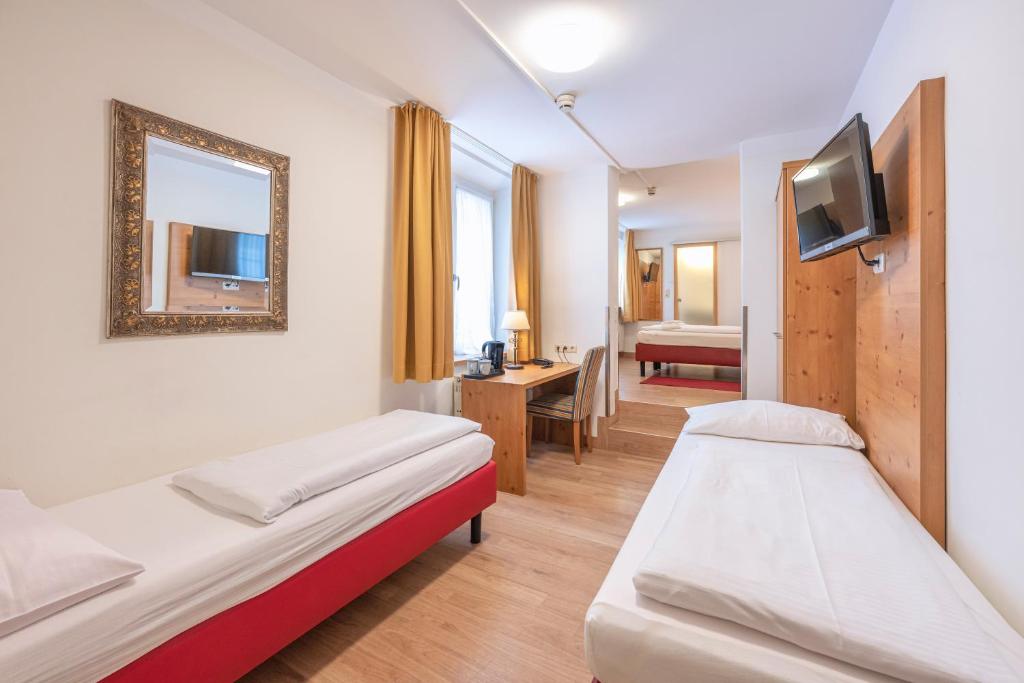 Postel nebo postele na pokoji v ubytování Hotel Eder