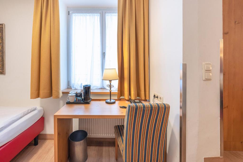 Postel nebo postele na pokoji v ubytování Hotel Eder