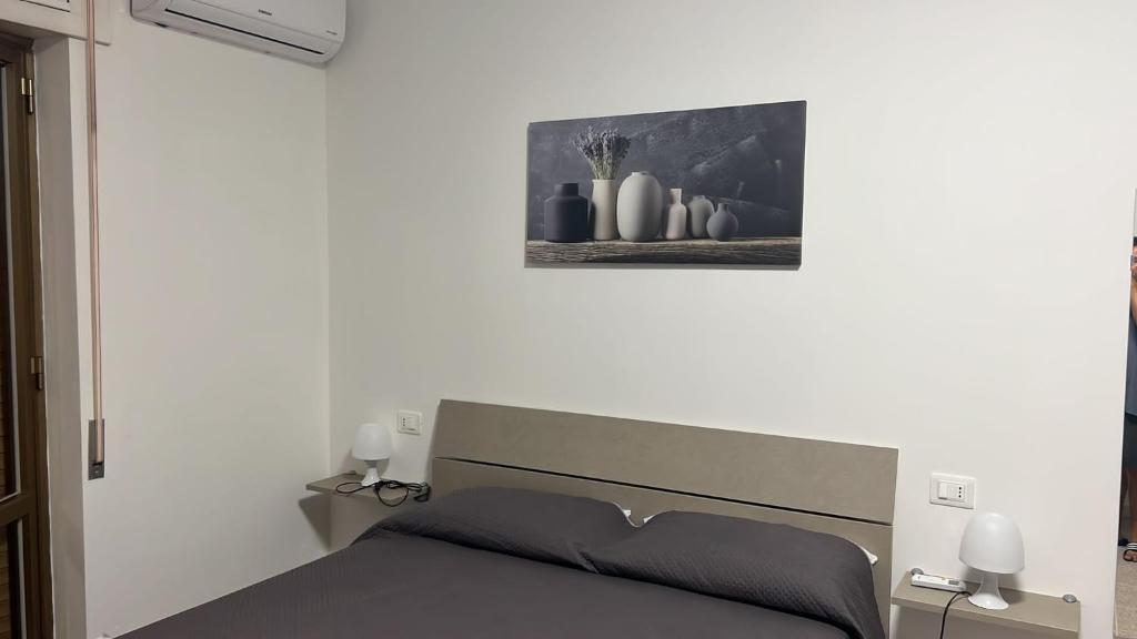 Postel nebo postele na pokoji v ubytování B&b Ciriapples