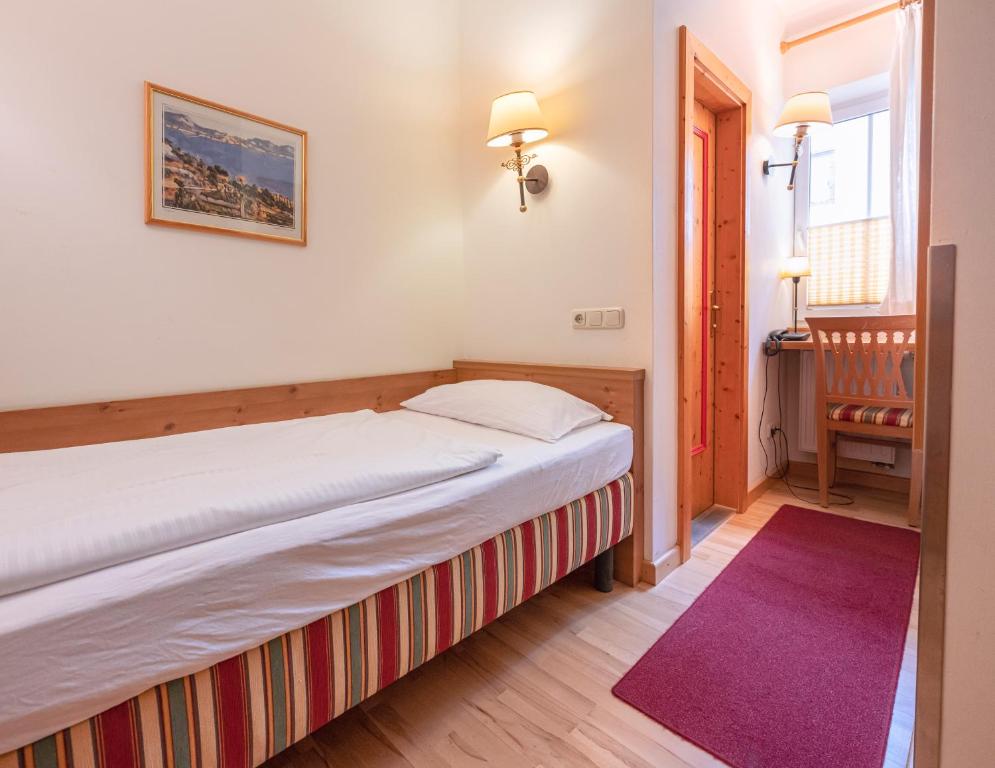 Postel nebo postele na pokoji v ubytování Hotel Eder