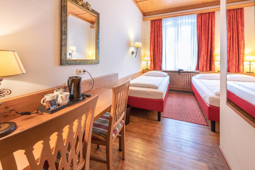 Postel nebo postele na pokoji v ubytování Hotel Eder