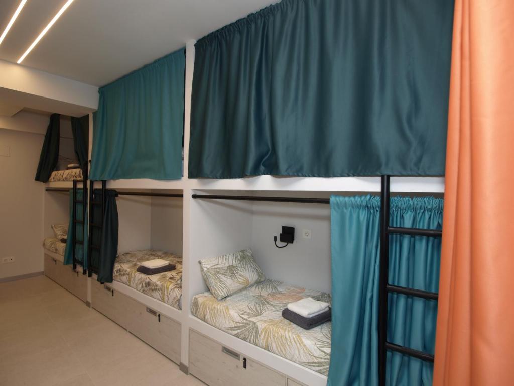 Postel nebo postele na pokoji v ubytování HOSTEL ALEA
