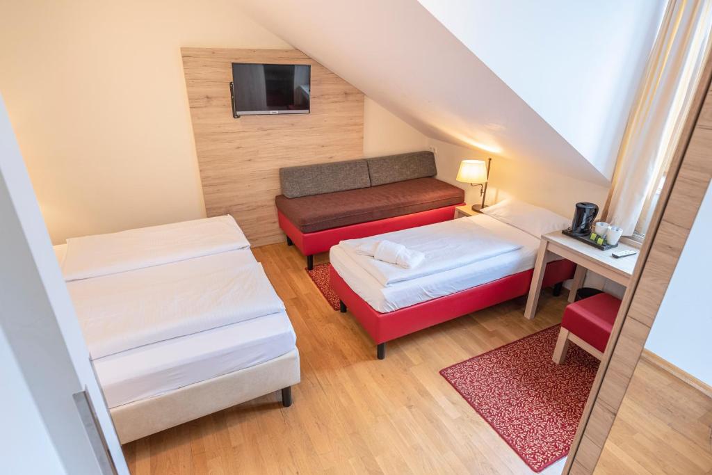 Postel nebo postele na pokoji v ubytování Hotel Eder