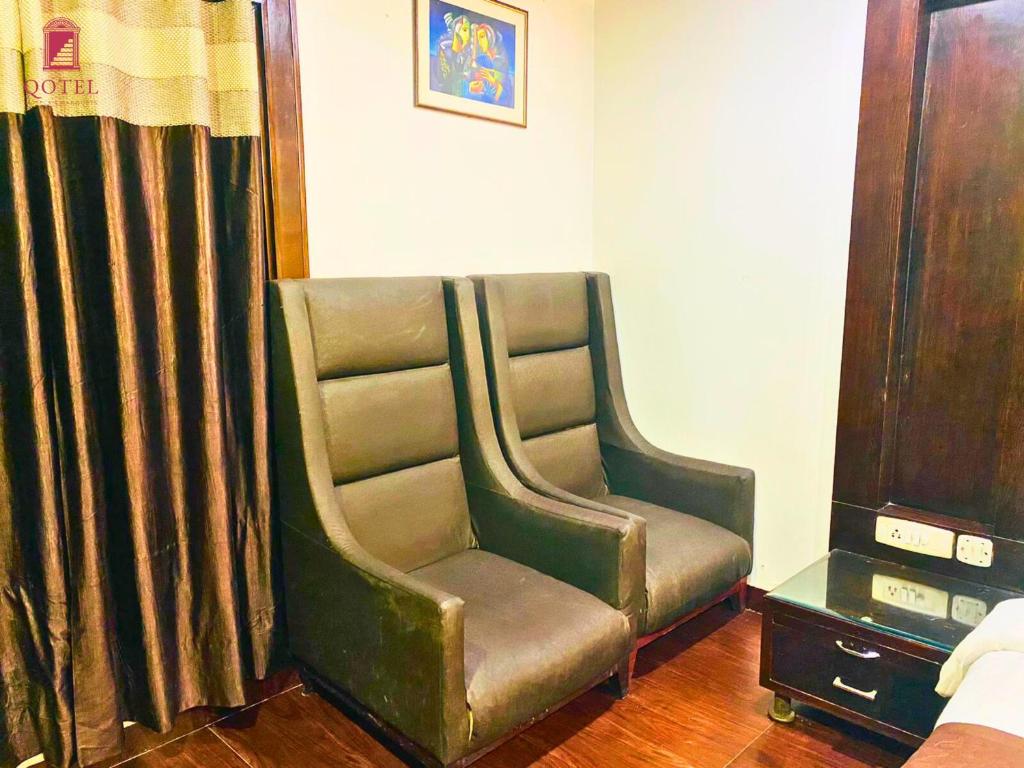 Posezení v ubytování Qotel Express Pitampura Couple Friendly