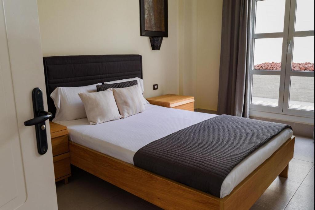 A bed or beds in a room at Villa Seduttori by MZ Villas