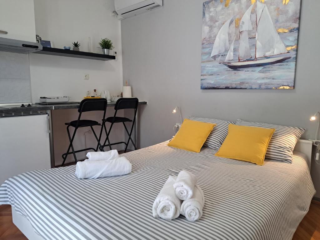 Postel nebo postele na pokoji v ubytování Apartman dida Jakov