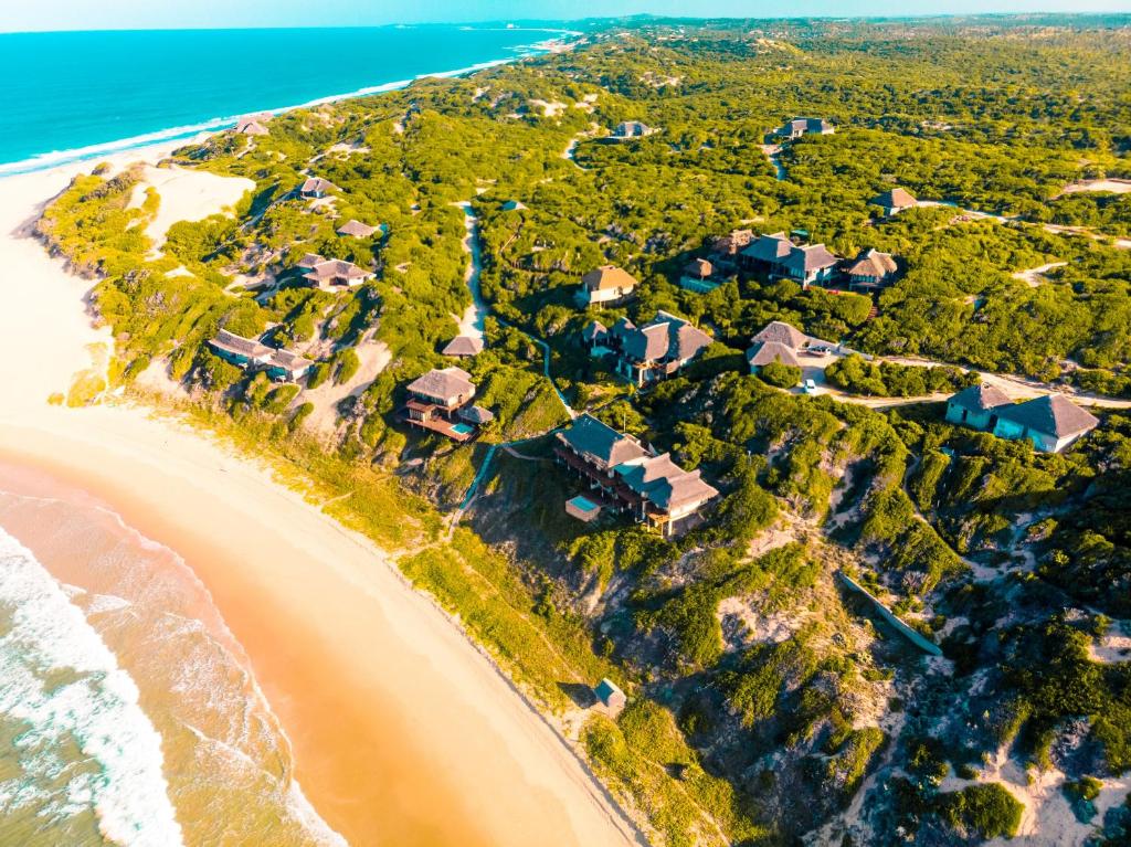 an aerial view of a home next to the ocean at The Beach House in Inhambane