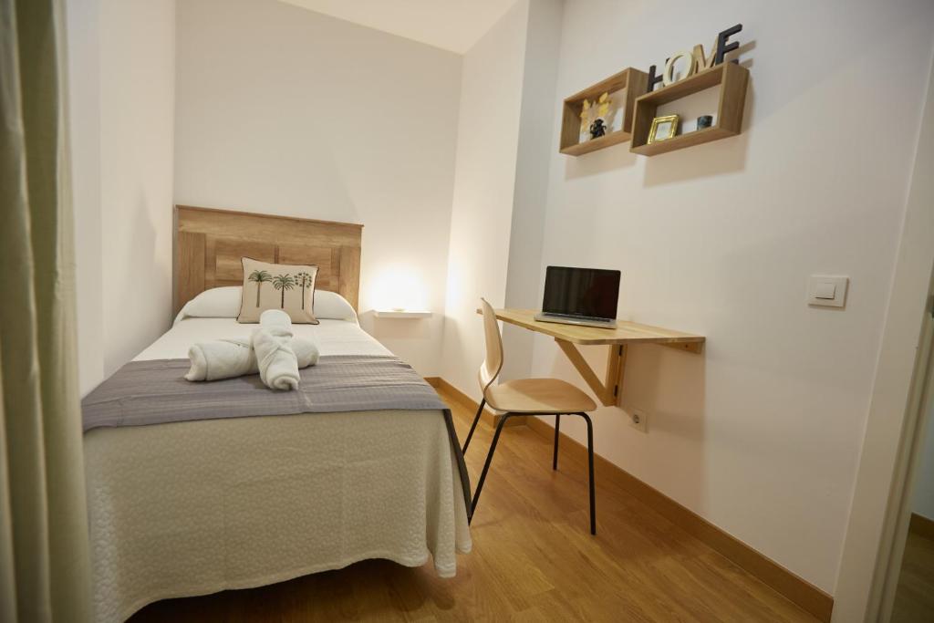 Posteľ alebo postele v izbe v ubytovaní Canteras Suite Gran Canaria