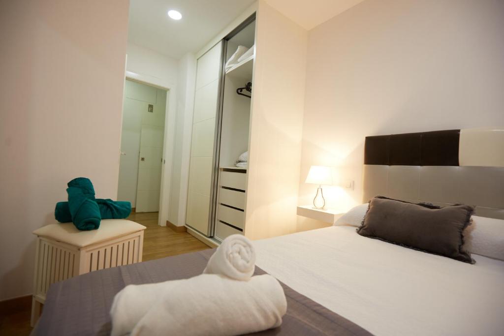 Posteľ alebo postele v izbe v ubytovaní Canteras Suite Gran Canaria