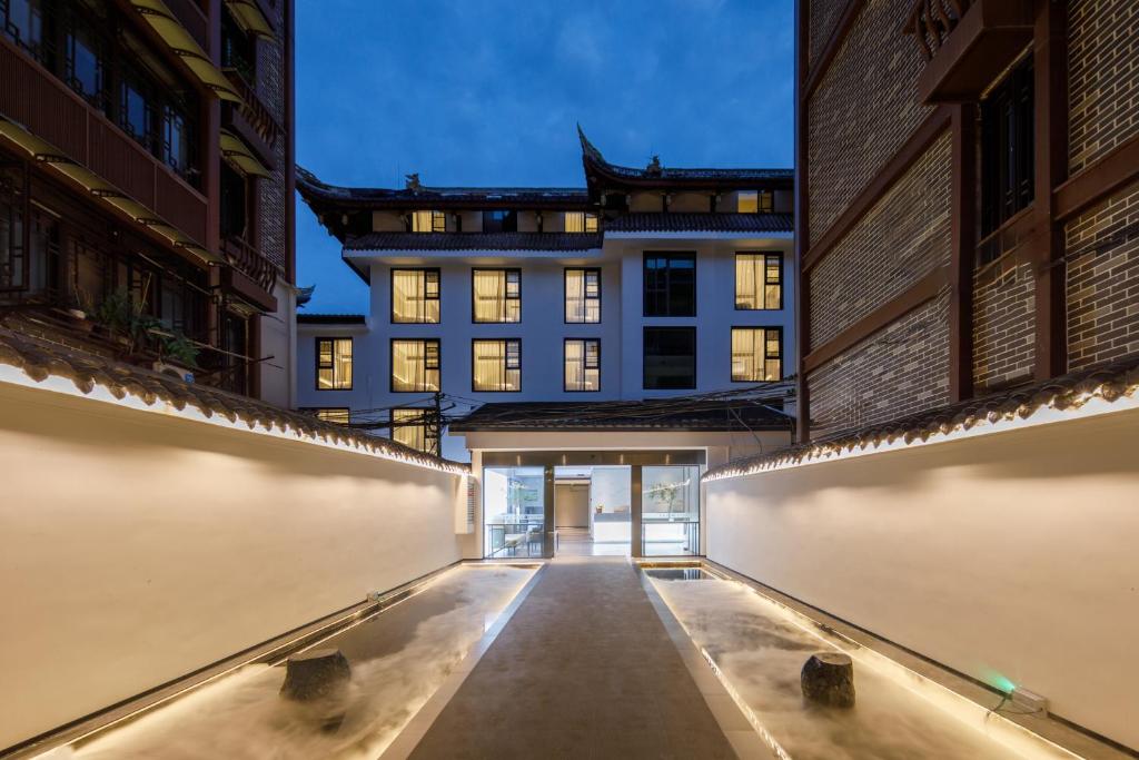 Fotografie z fotogalerie ubytování Gongxili - Xige Hotel Free Welcome Tea and Dessert v destinaci Čcheng-tu