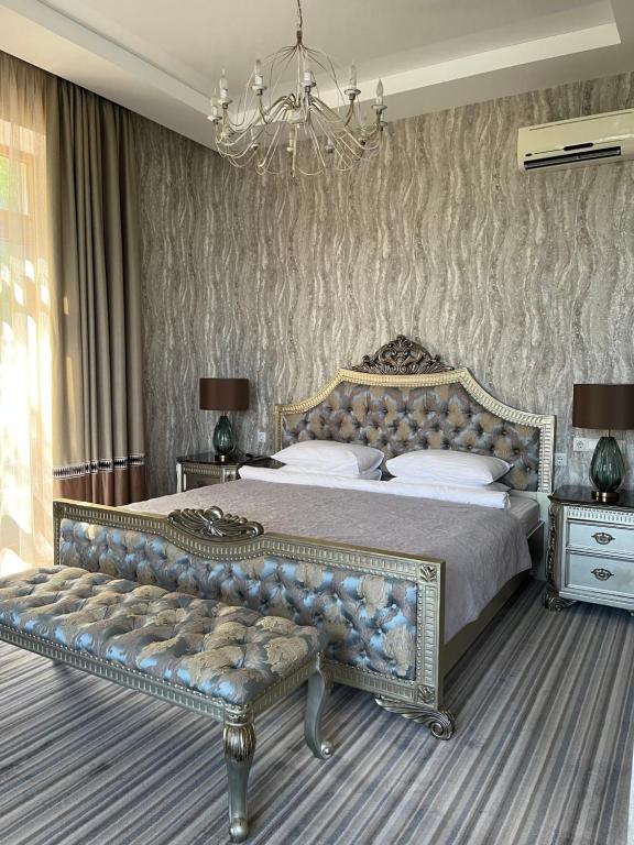 Postel nebo postele na pokoji v ubytování Villa-Sofia Mini-hotel