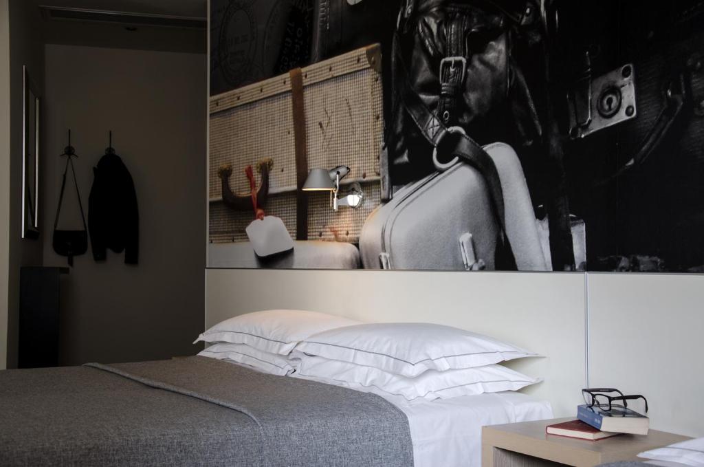 Postel nebo postele na pokoji v ubytování Key Hotel