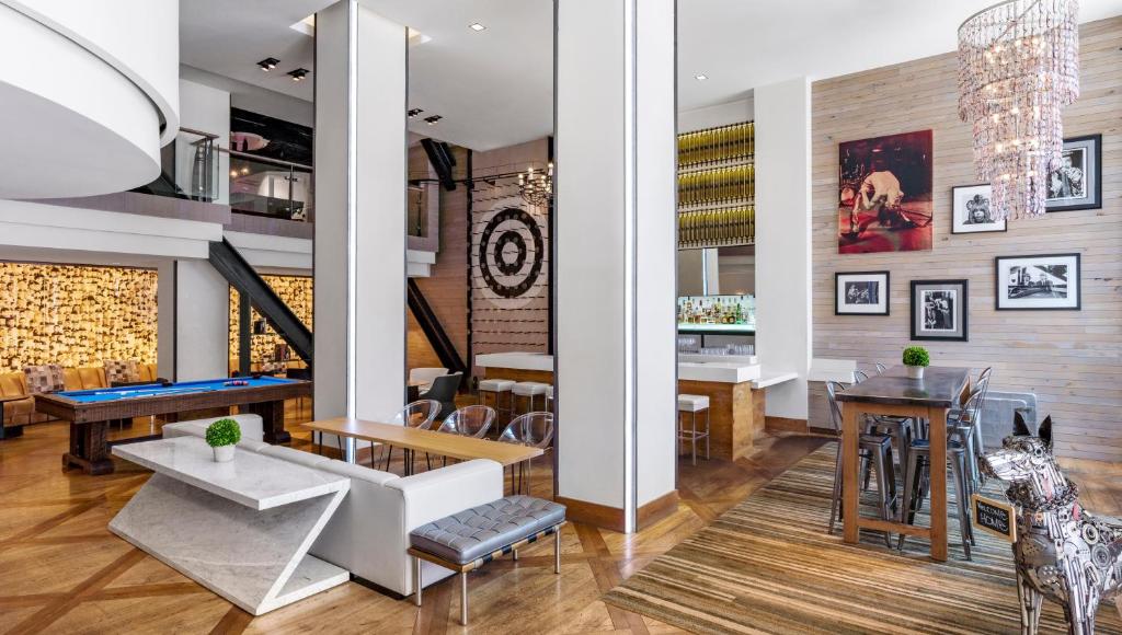 a living room with a dog standing in the middle at Hotel Zetta San Francisco in San Francisco