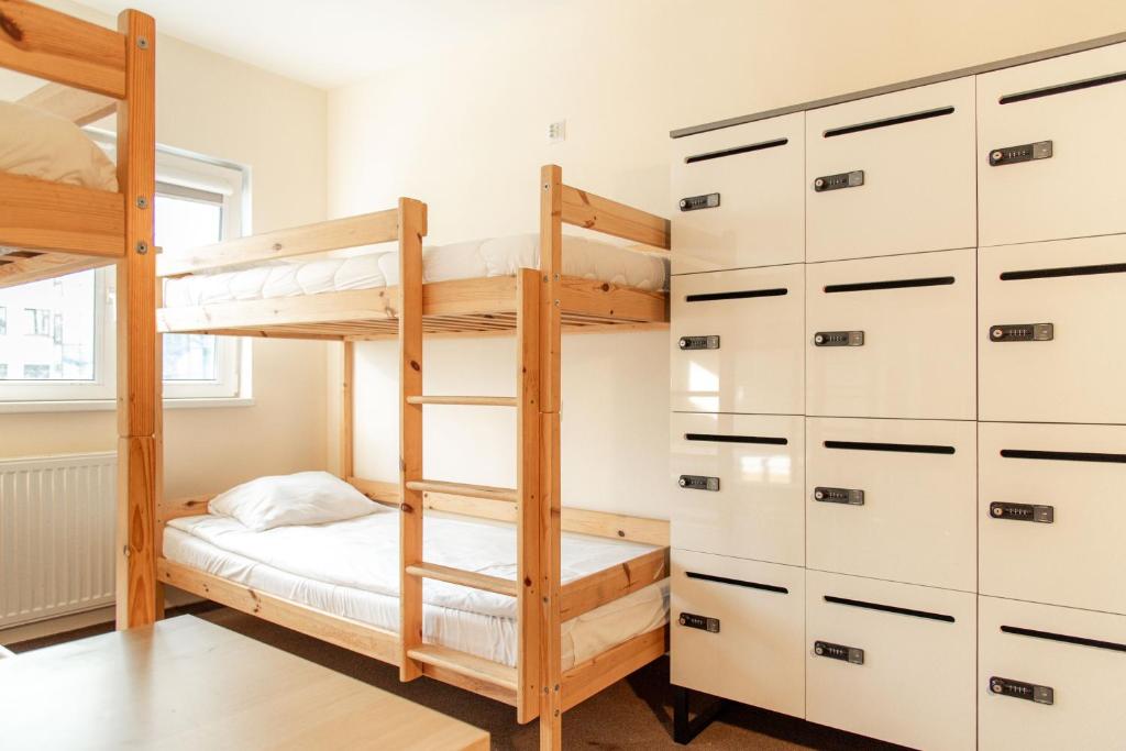 Postel nebo postele na pokoji v ubytování Luxhostel24 Warsaw