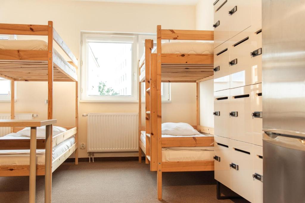 Postel nebo postele na pokoji v ubytování Luxhostel24 Warsaw