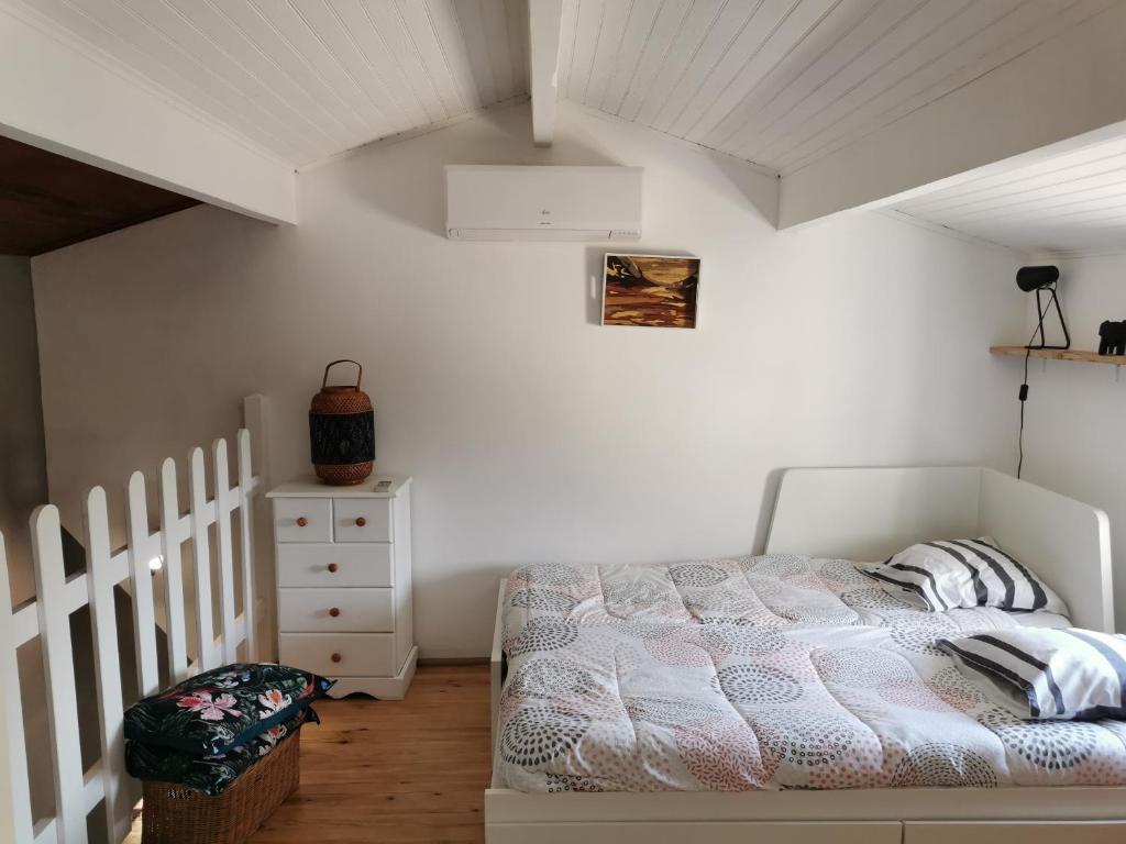 Posteľ alebo postele v izbe v ubytovaní La Petite Maison
