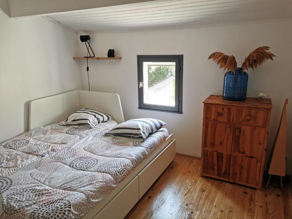 Posteľ alebo postele v izbe v ubytovaní La Petite Maison