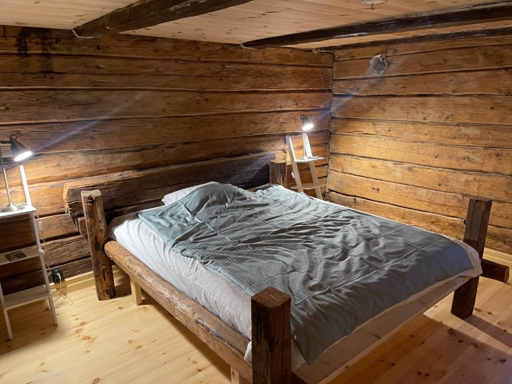 Postel nebo postele na pokoji v ubytování Stocklycke Vandrarhem