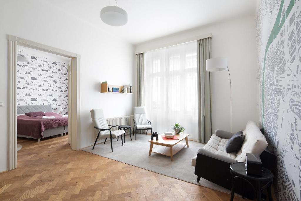 a living room with a couch and a table at Best Place in Prague in Prague