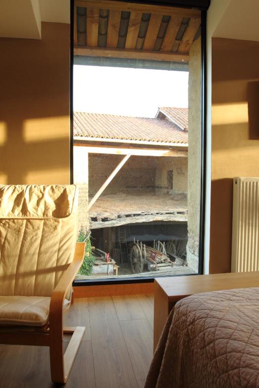 Posezení v ubytování La ferme de Berlioz