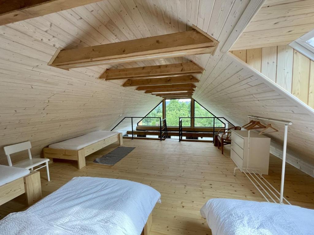 Postel nebo postele na pokoji v ubytování Apartmány Na Smrčku