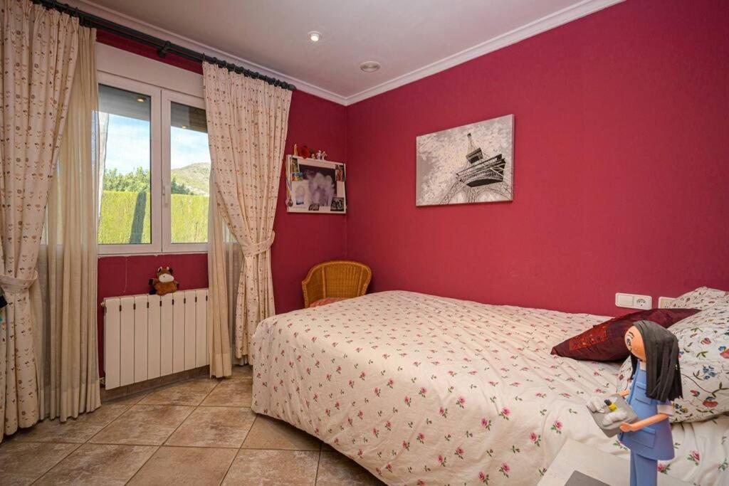 Postel nebo postele na pokoji v ubytování VILLA TROSSOS