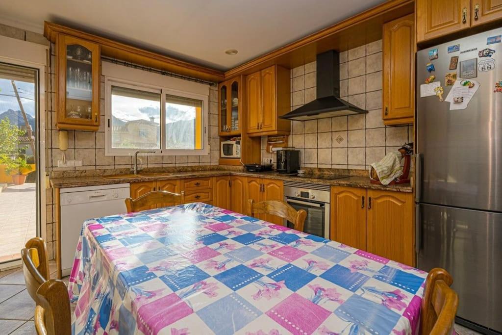 Kuchyň nebo kuchyňský kout v ubytování VILLA TROSSOS