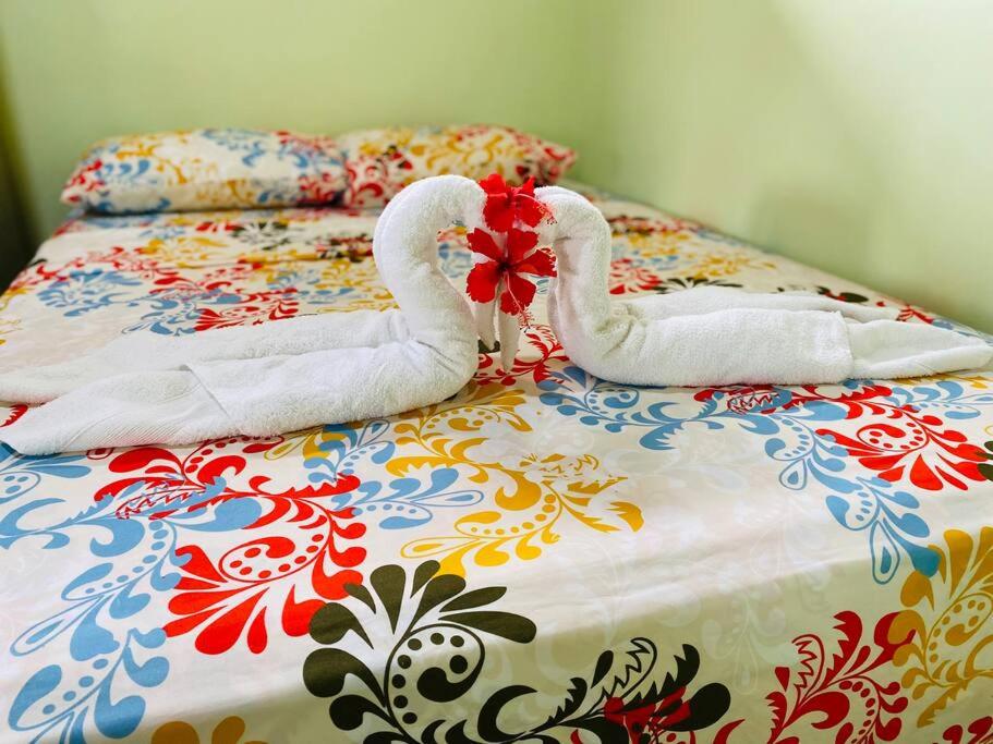 Postel nebo postele na pokoji v ubytování Casita Colorada, Sierpe de Osa