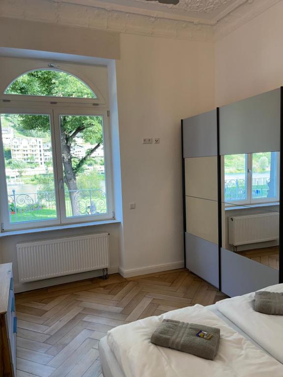 Postel nebo postele na pokoji v ubytování Moseltürmchen Cochem