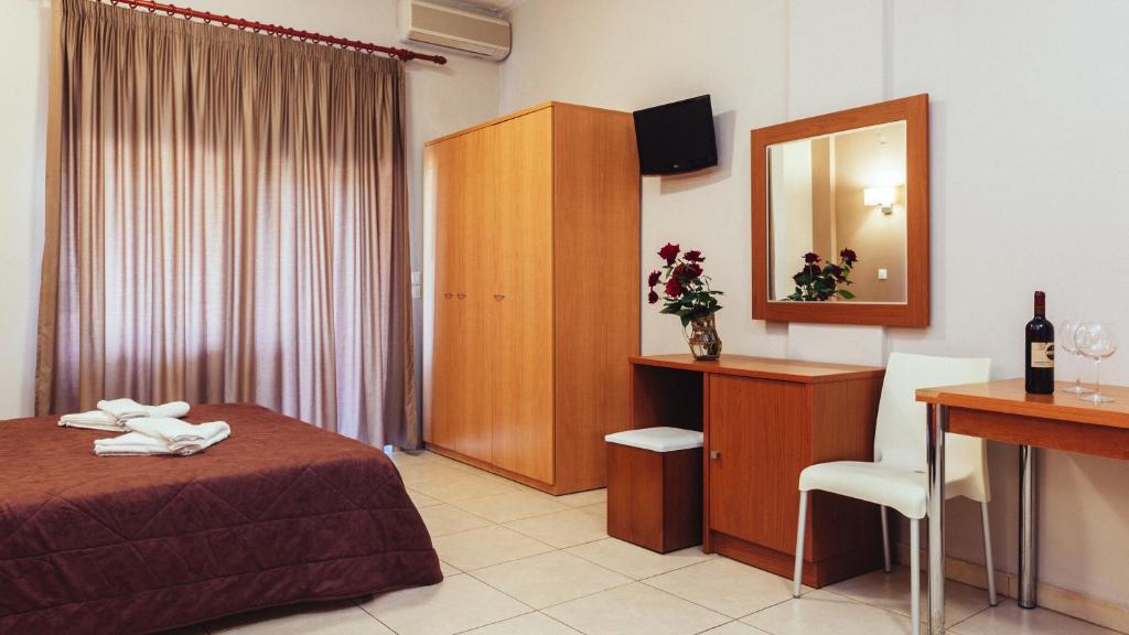 TV a/nebo společenská místnost v ubytování Hotel Apanema