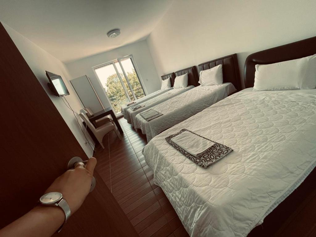 Postel nebo postele na pokoji v ubytování Hotel Konstantin