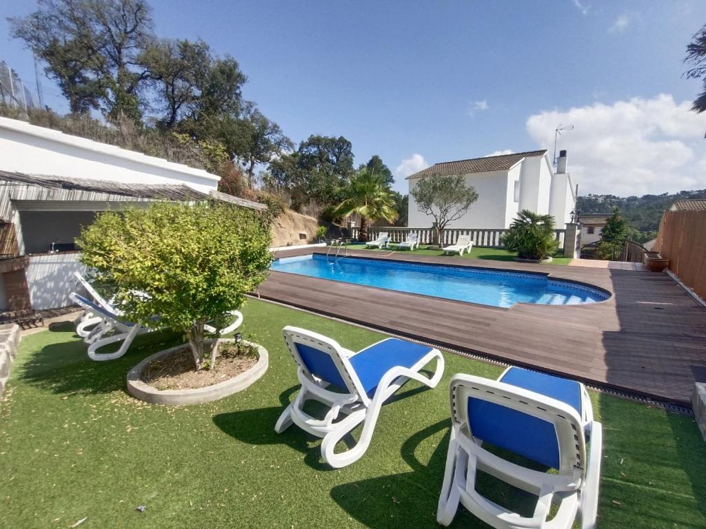 The swimming pool at or close to Bright Villa in Vidreres with Private Pool and Jacuzzi