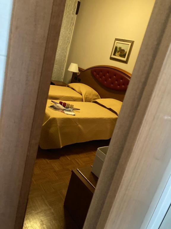 Postel nebo postele na pokoji v ubytování Hotel Banatium B&B Cucina