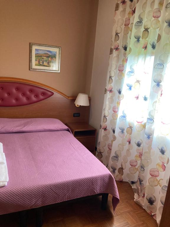 Postel nebo postele na pokoji v ubytování Hotel Banatium B&B Cucina